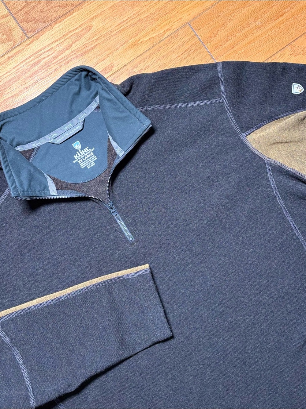 Kuhl Men’s Black Quarter-Zip Sweater with Tan Accents